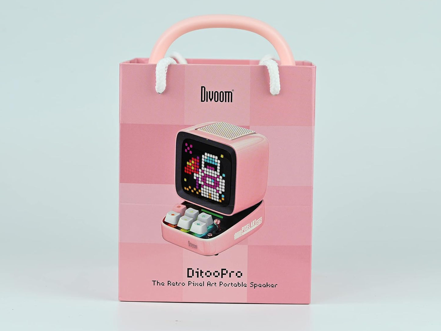 Experience Fun and Creativity with the Ditoo Retro Pixel Art Bluetooth Speaker - App Controlled LED Display in Playful Pink